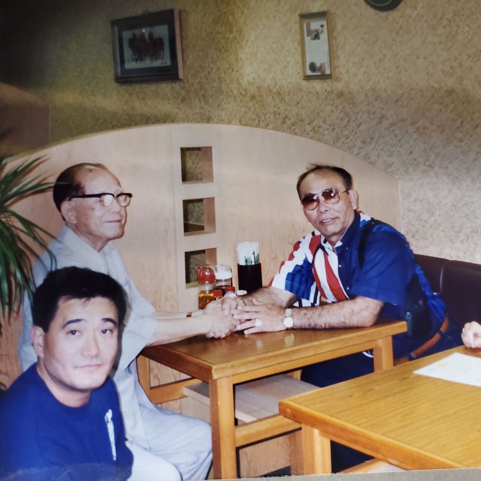 Taika Seiyu Oyata alongside Hanshi Seiken Takamine