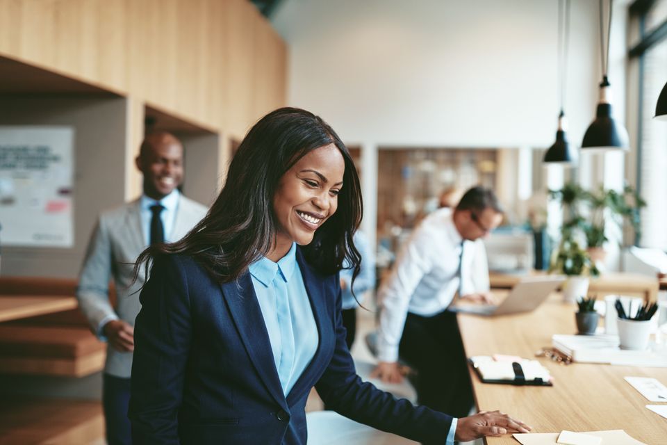 Smiling african american businesswoman sitting dow 2023 11 27 04 56 48 utc