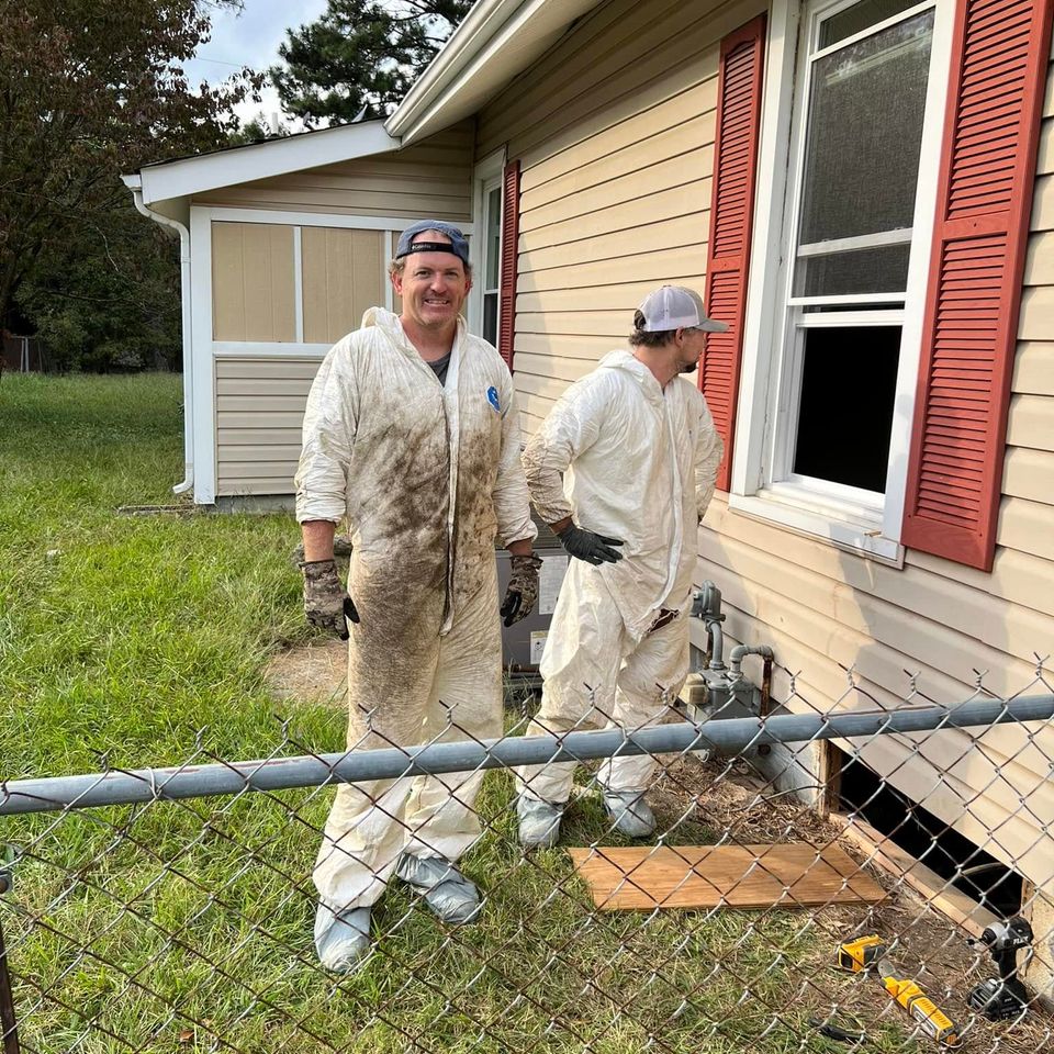Matt Hefner and crew of Hefner Construction Plumbing in crawl space