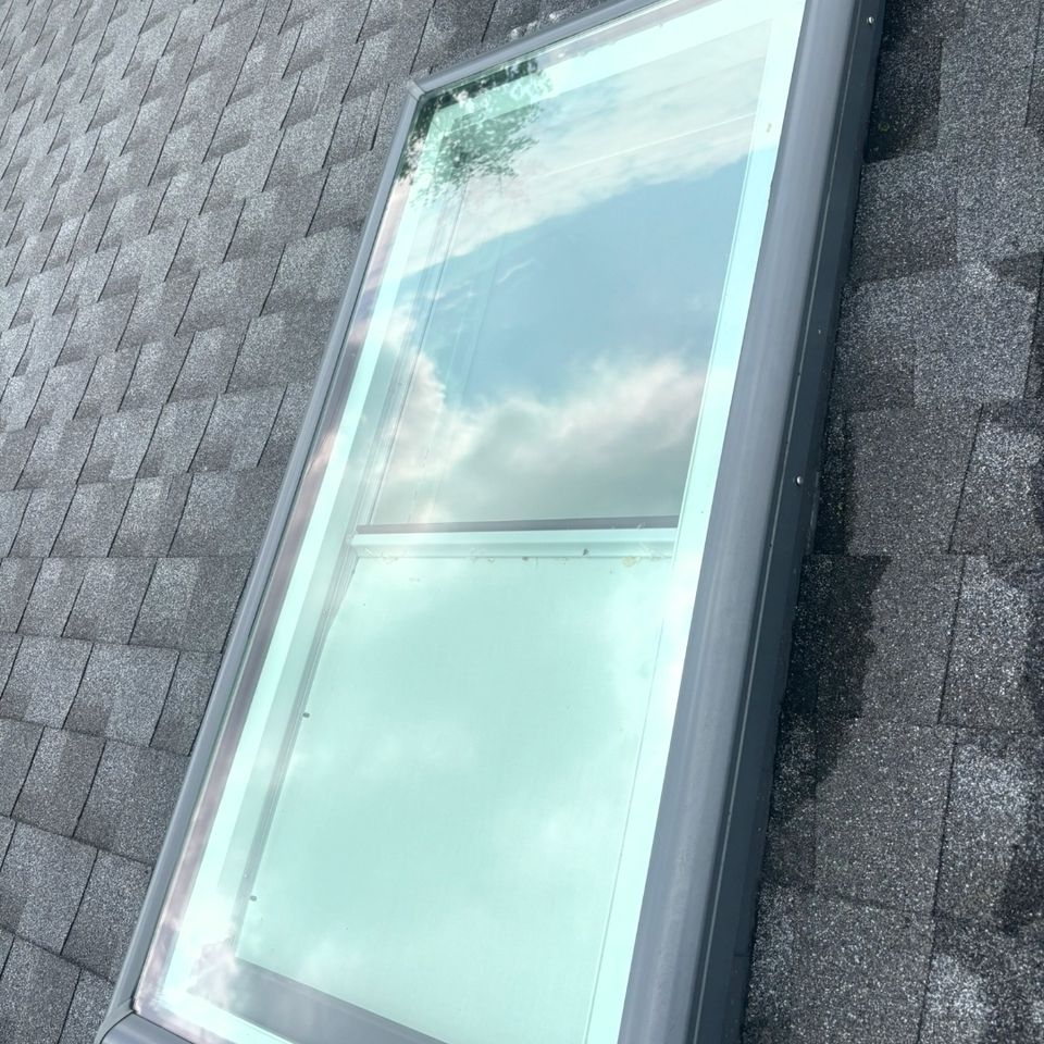 Clean skylight glass on shingle roof after exterior window cleaning in Harrisburg PA