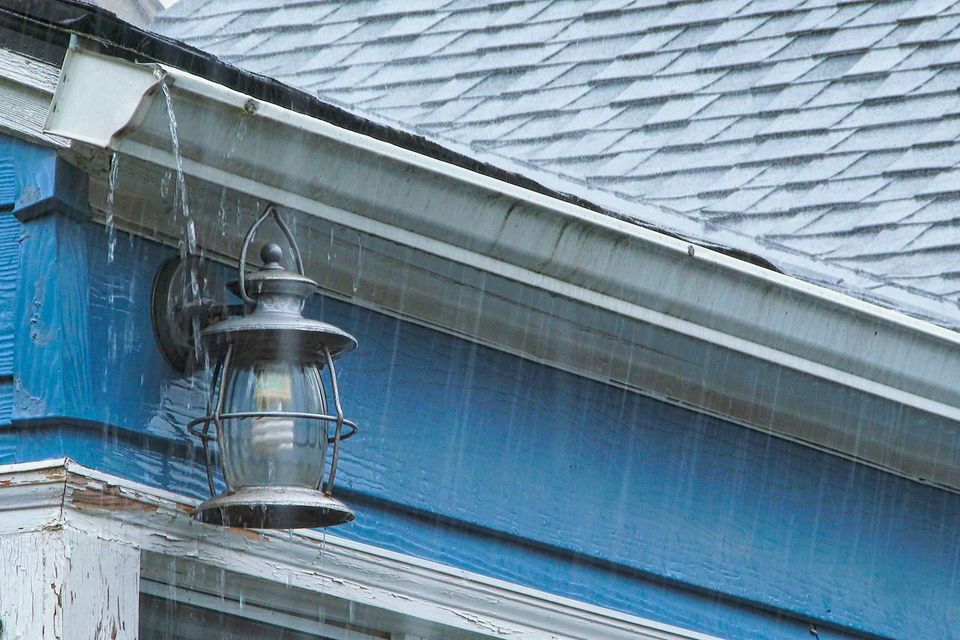 Heavy rain and over flowing gutters sbi 351244371