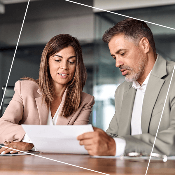 Man and women discussing document