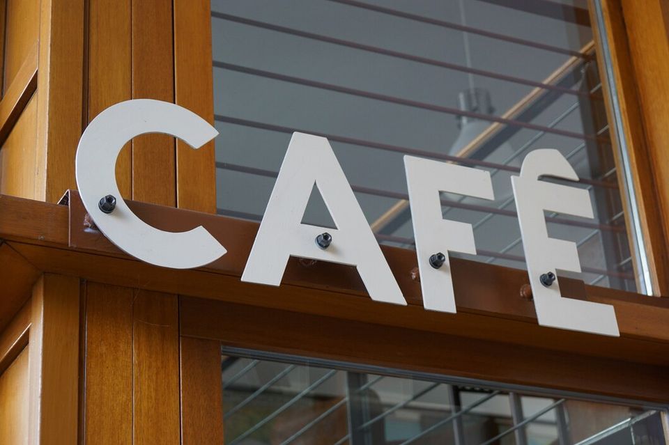 Closeup cafe sign fixed wooden beam shop 181624 33183