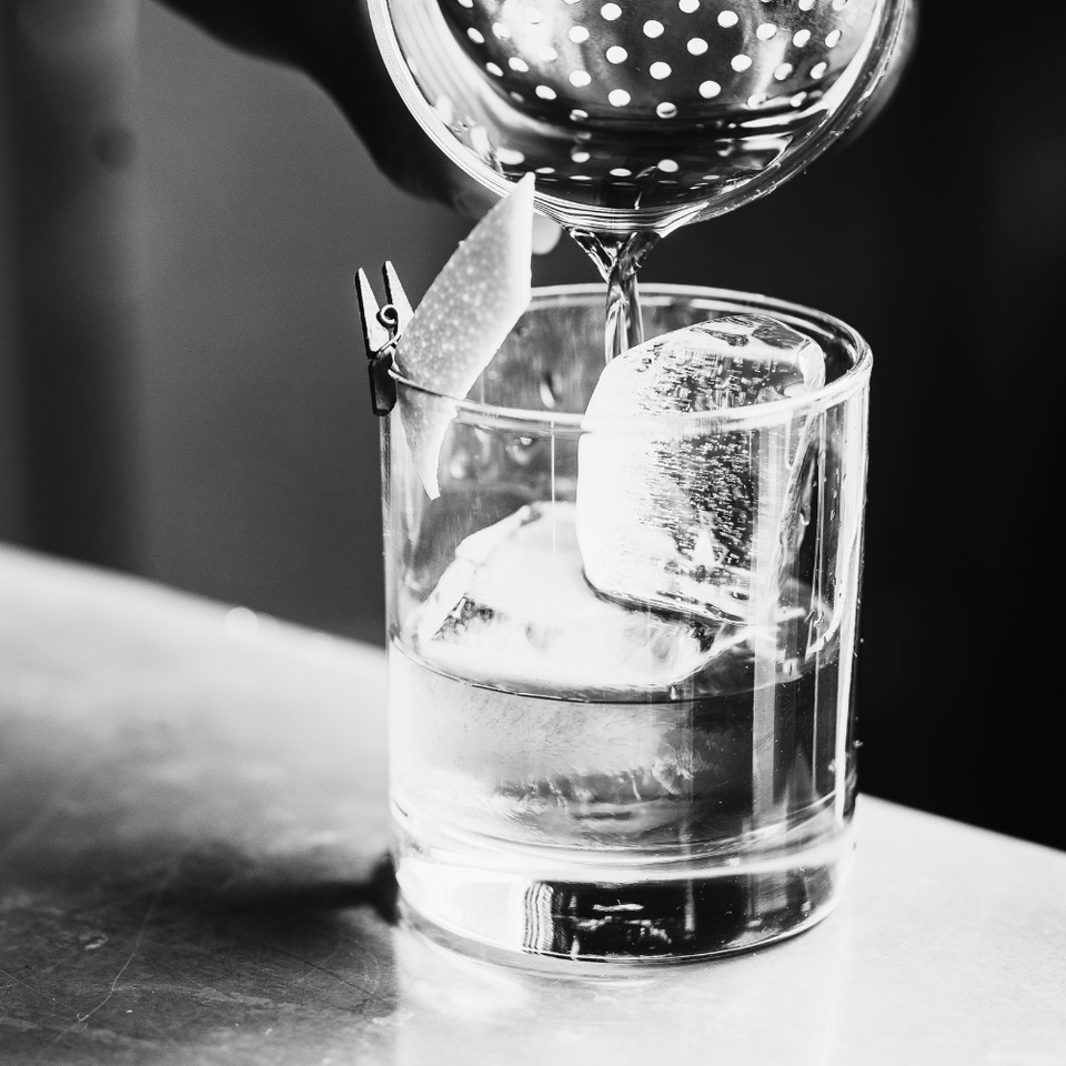 A craft cocktail being poured at Jilly's.