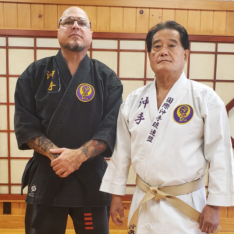 Hanshi Takamine and Renshi Patrick Trovato posing
