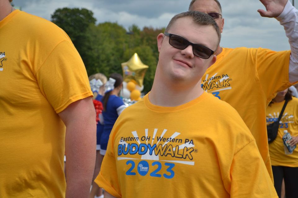 Participant wearing a 2023 Buddy Walk shirt at the Down Syndrome Association of the Valley event.
