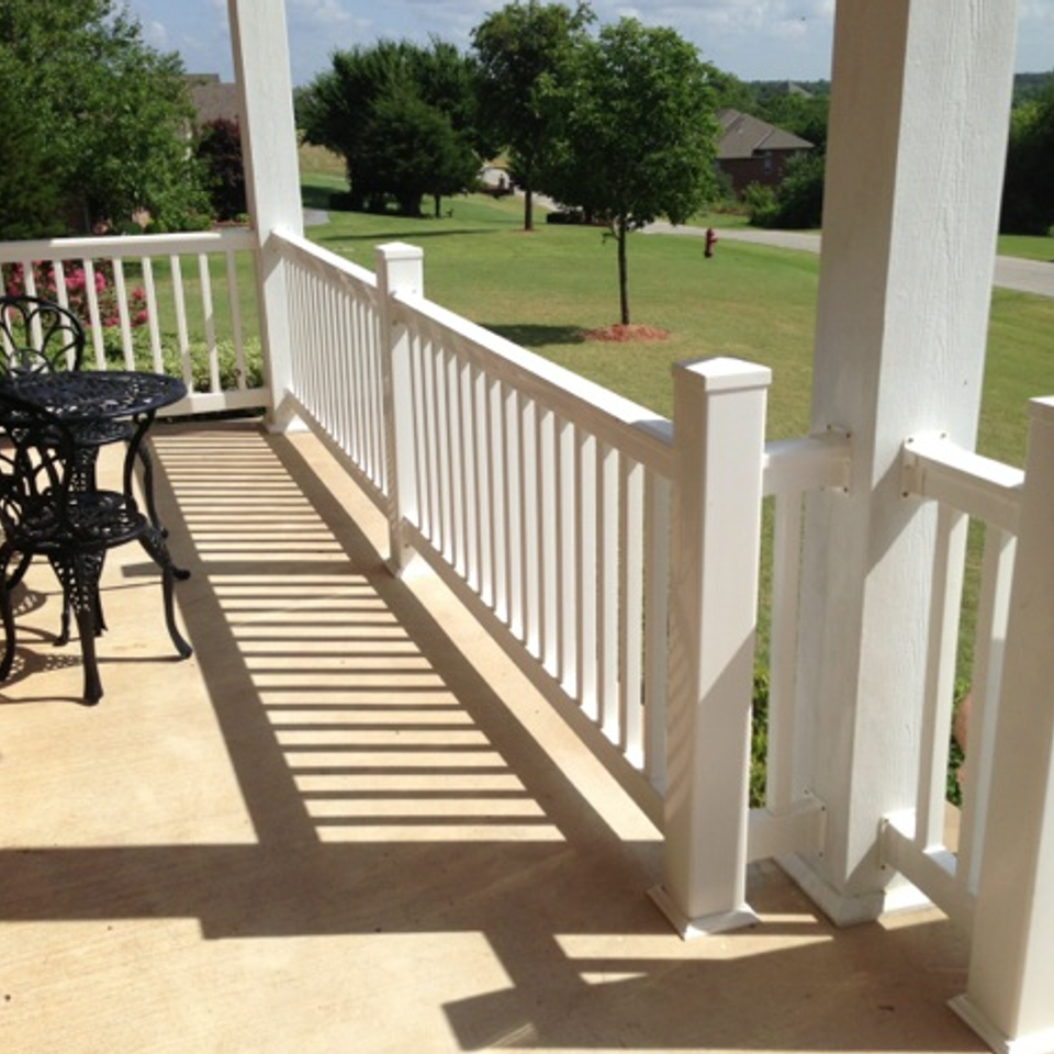 Midland vinyl fence   deck company   tulsa and coweta  oklahoma   vinyl metal wood fence sales and installation   outdoor living  railing   white vinyl railing on covered front porch  looking out20170611 18629 e7edb4