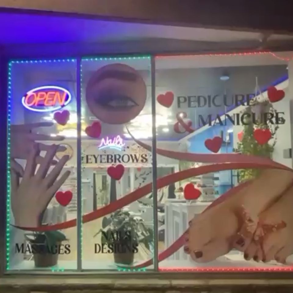 An outdoor photo of Nail Lovers in Sound Beach at night