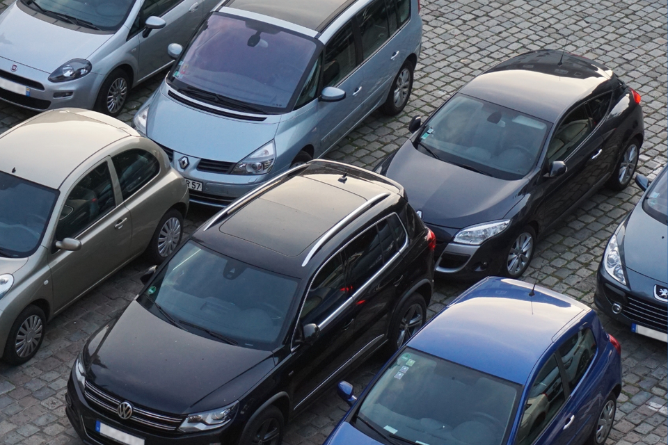 Multiple vehicles parked together, representing warranty-supported automotive repair services.