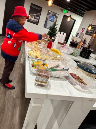 Ms. hazel preparing the celebration lunch