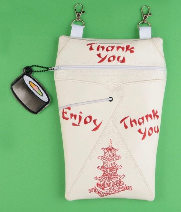Custom embroidered zipper pouch designed like a takeout food container with red lettering and sushi-themed zipper charm.