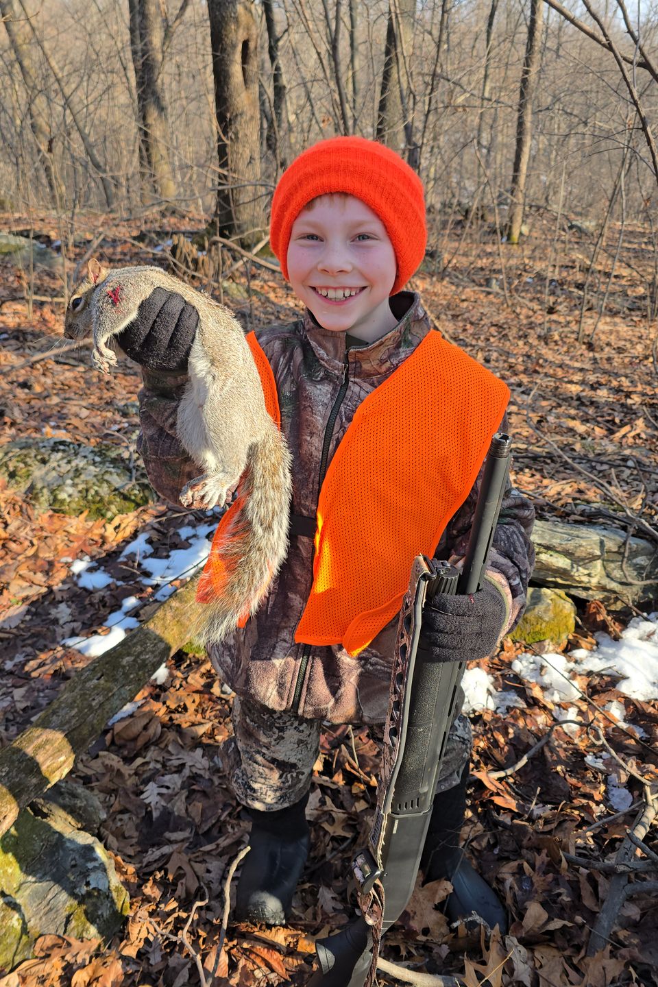 Ten-year-old Silas Dull shot his first squirrel with a 20-gauge shotgun in February