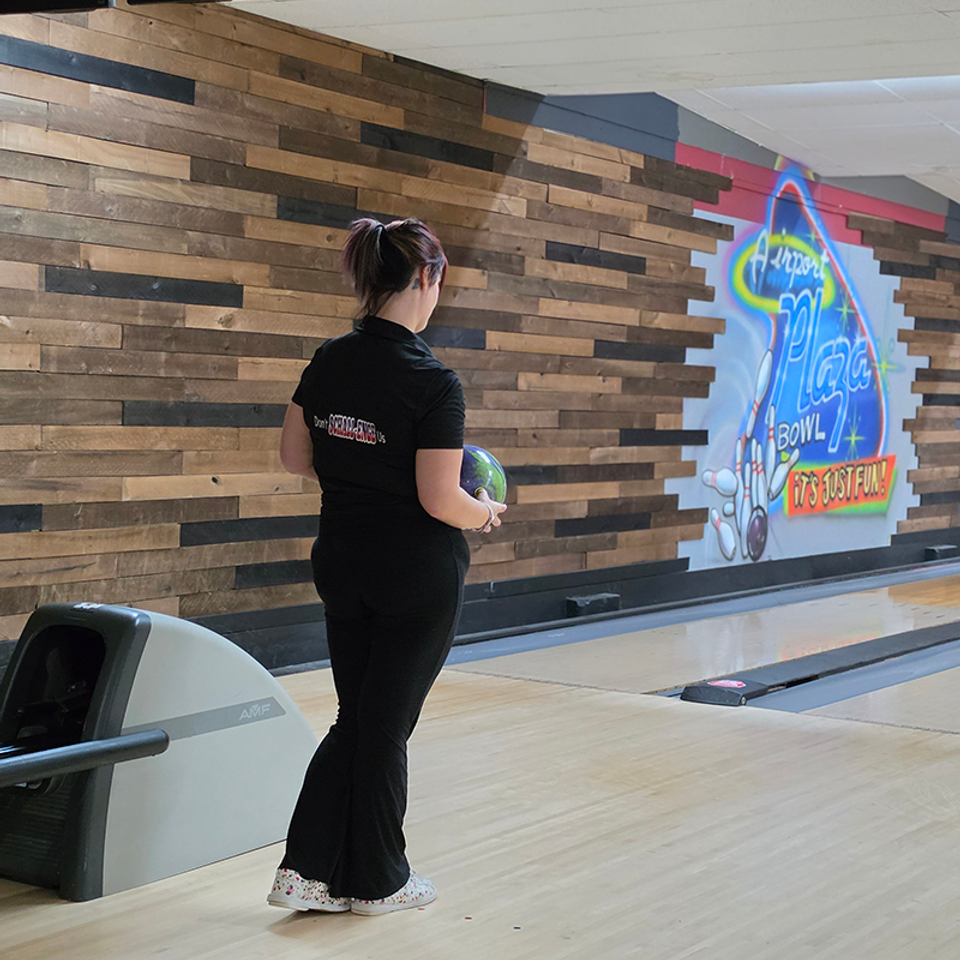 Bowler & logo wall