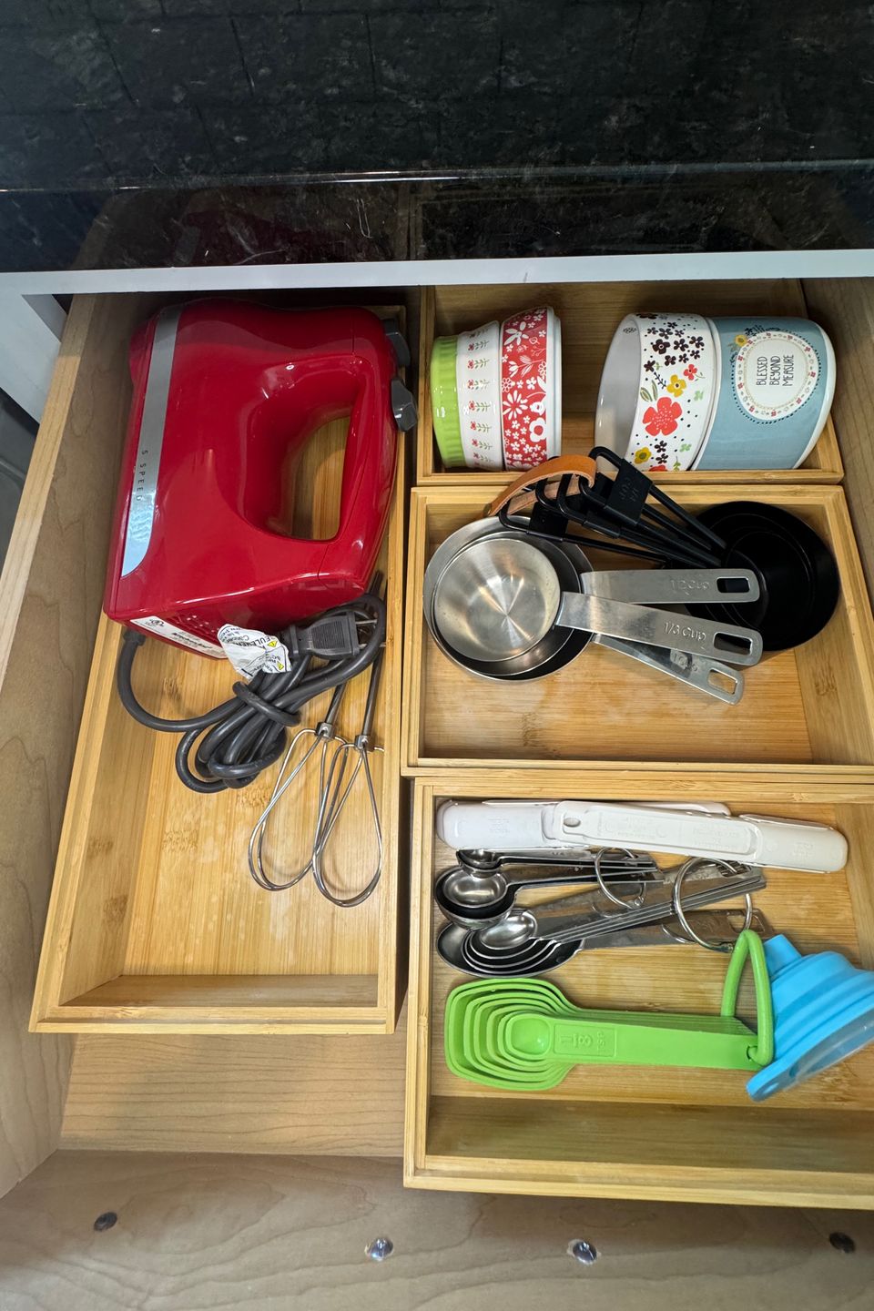Kitchen utensils in a droor