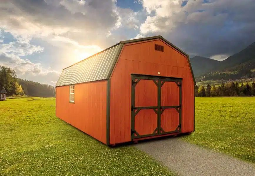 Orange high wall barn shed with double barn doors and metal roof in East Tennessee