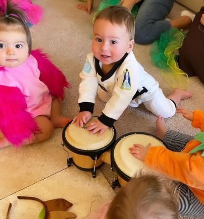 Baby with instrument