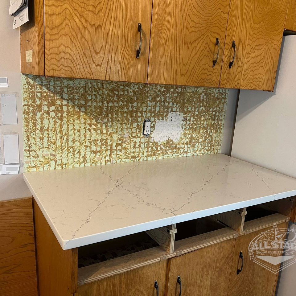 Houston kitchen countertop project with white stone surfaces and island