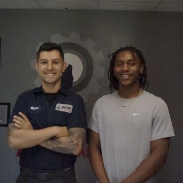 Miguel and michael side by side at elite tech auto