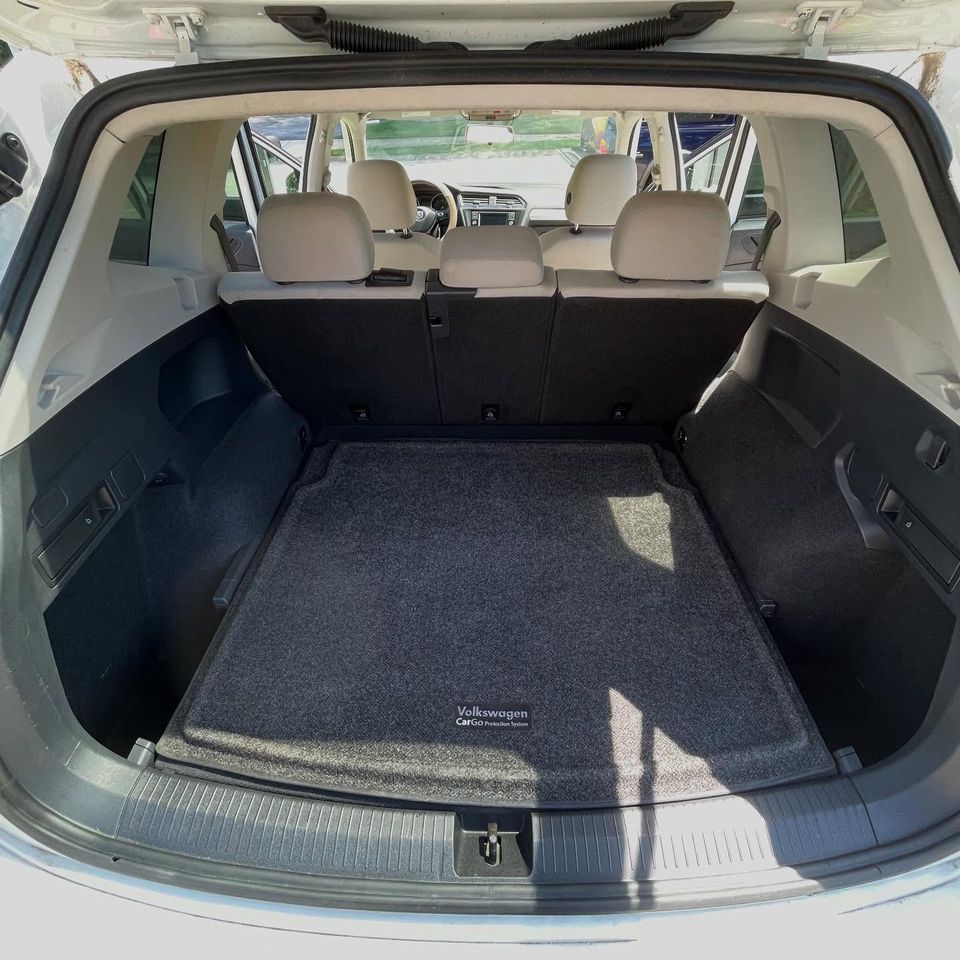 Spotless Volkswagen Tiguan cargo area with a vacuumed cargo mat after interior cleaning in Wilmington DE