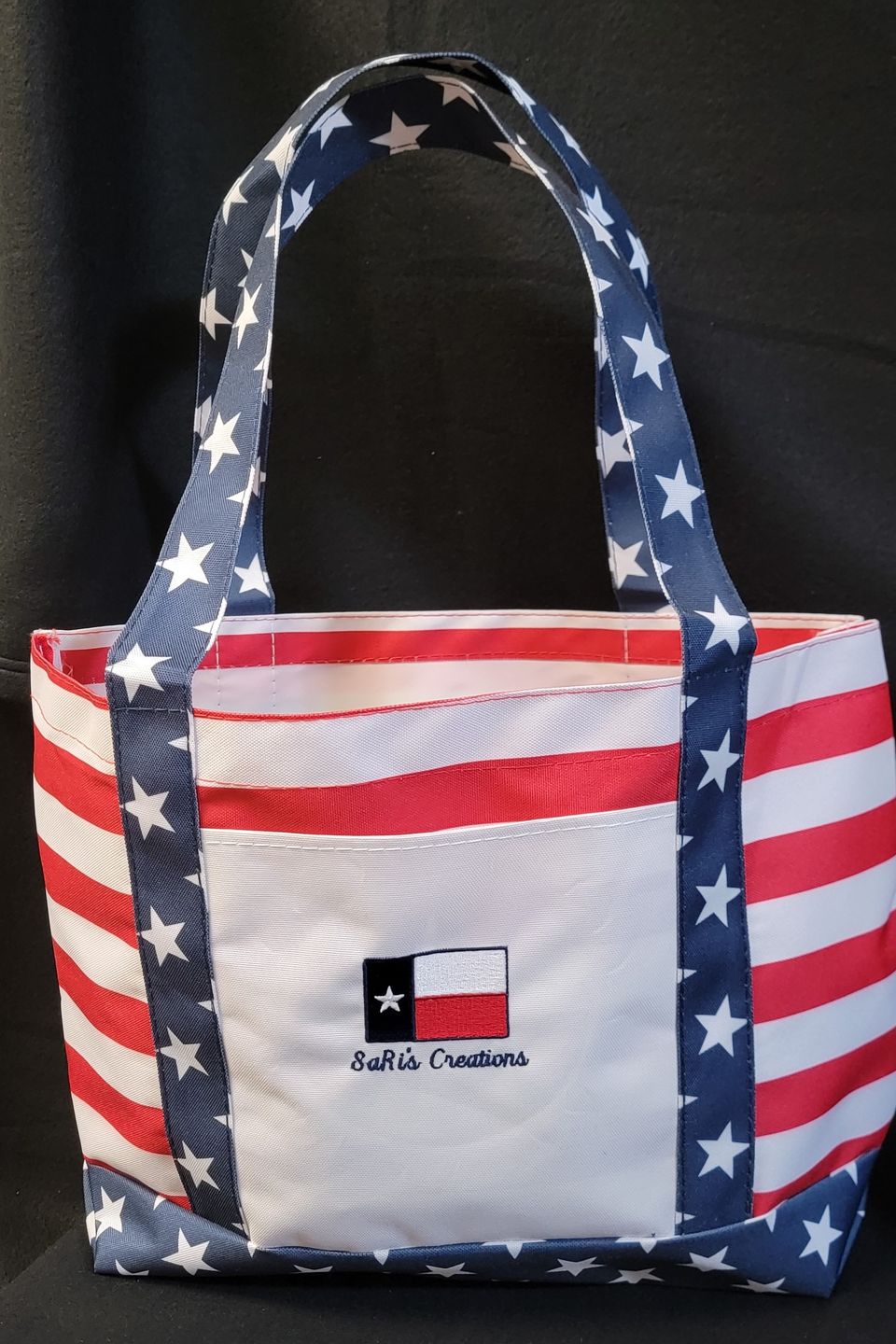 Sari's Creations logo below Texas flag with stars and stripes motif - embroidery example 