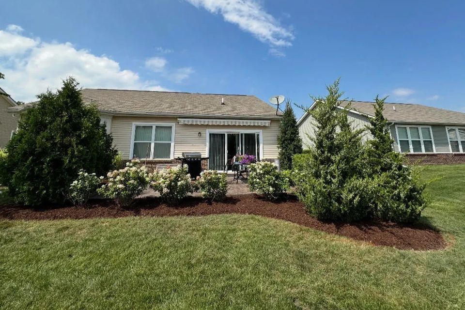 Wide view of a professional mulching job done by Vic's Landscaping of Michigan