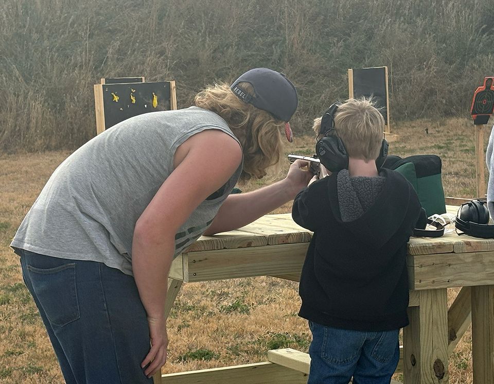 Dad and boy bb gun
