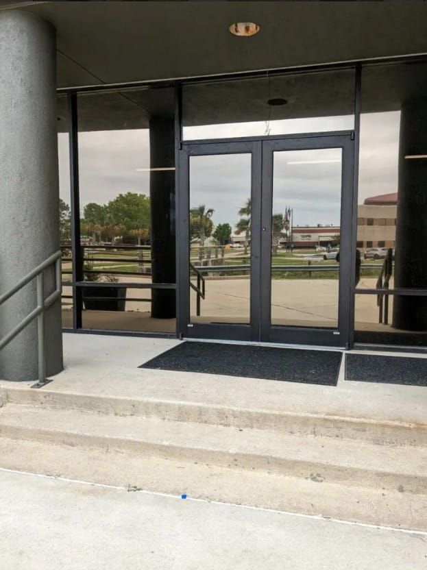 Commercial storefront window tint installation in Sugar Land