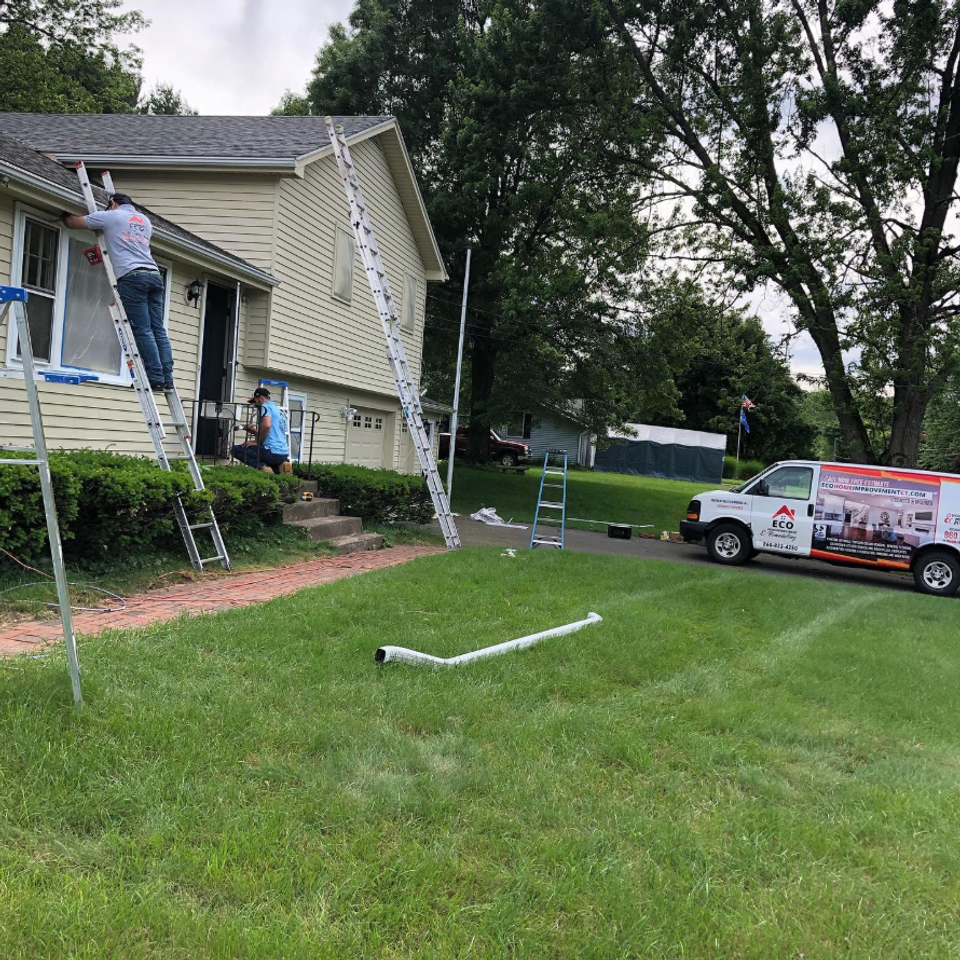 Exterior siding installation crew