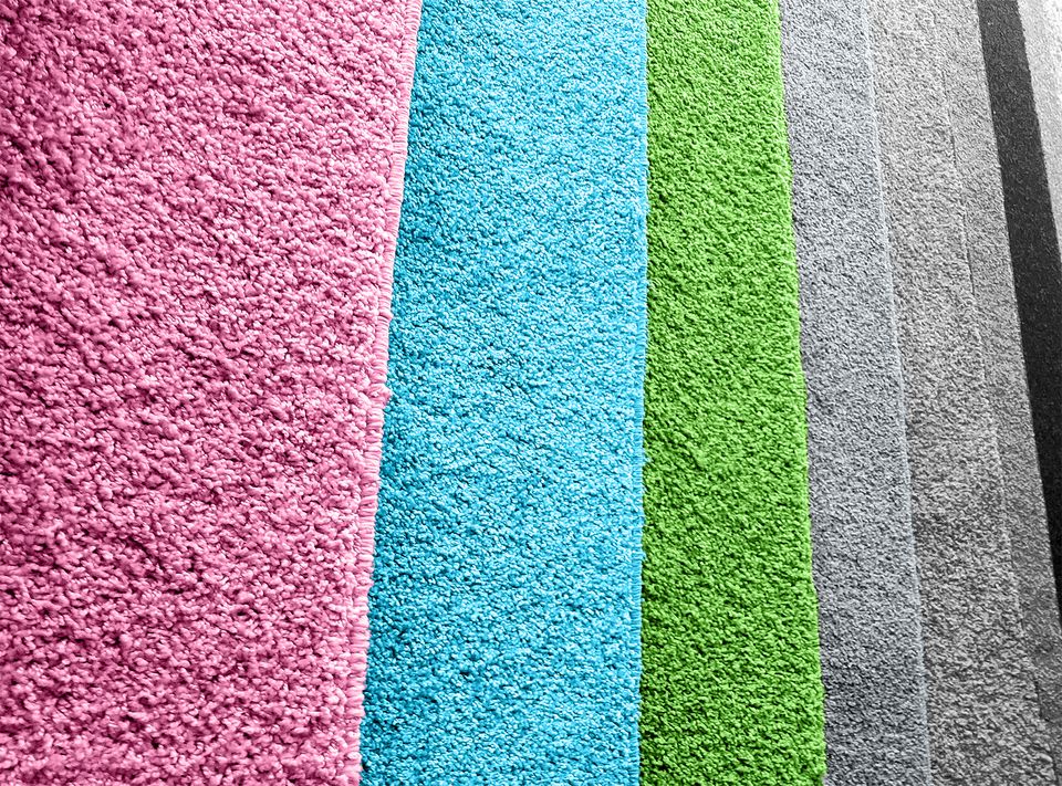 Different colors of carpets together