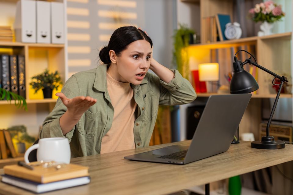 Medium vecteezy young woman on home table has emotional call on laptop and 83982698 medium