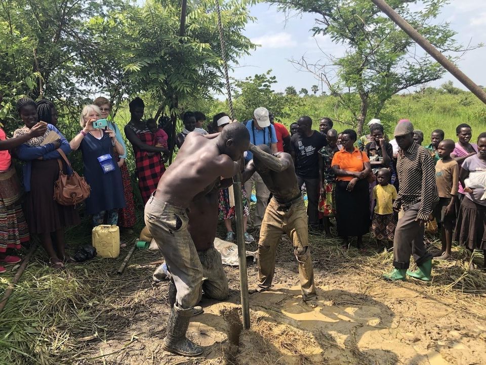 Africans Digging a Shallow Well