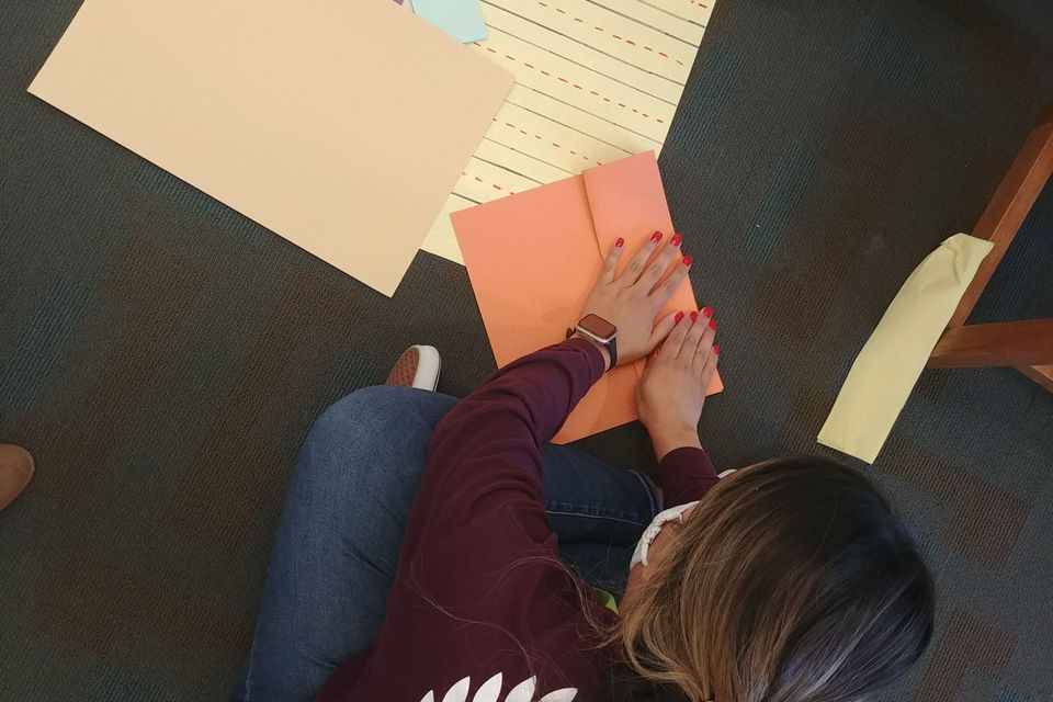 Teacher preparing our materials