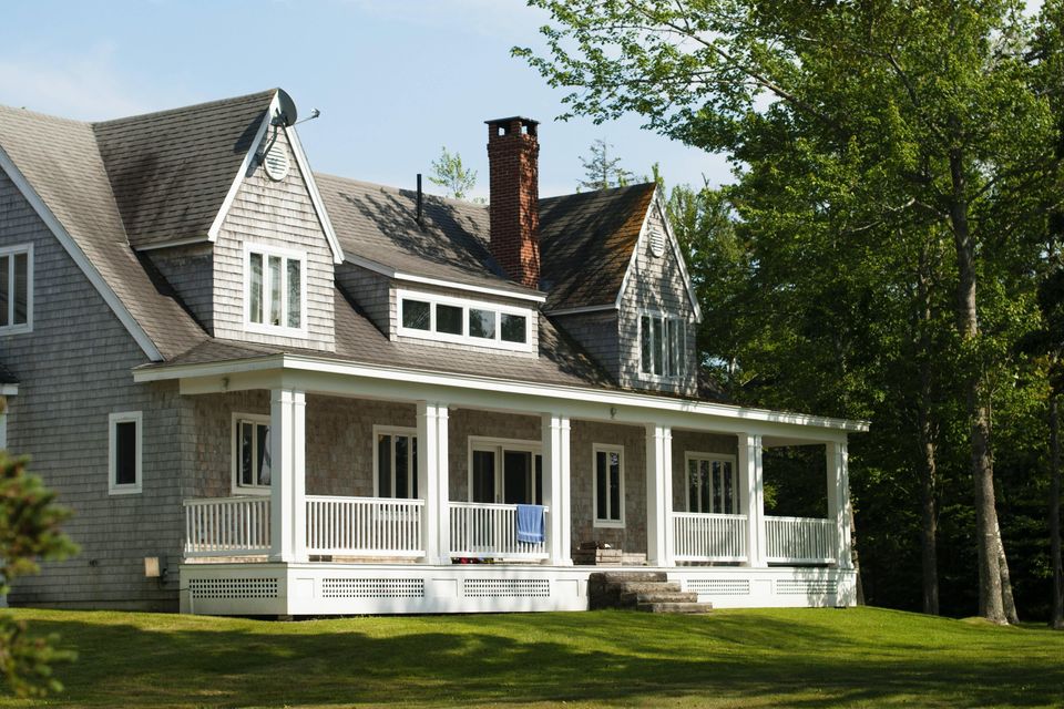 A home surrounded by Trees that are ready to be removed in DuPage County, IL.