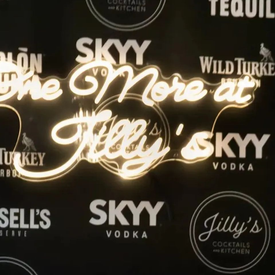 One more at Jilly's neon sign on the wall