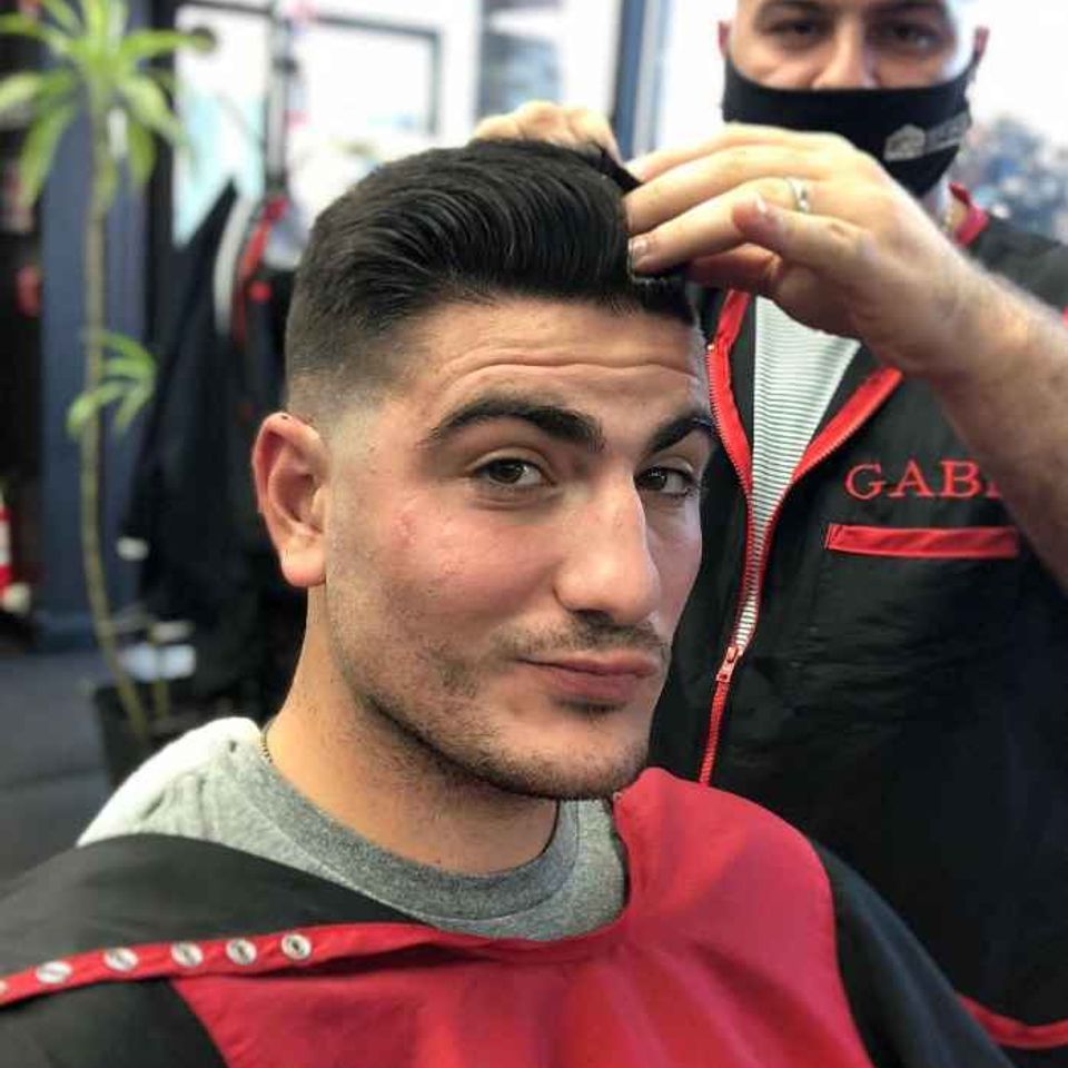 Sal and gabis barbershop sal with patron