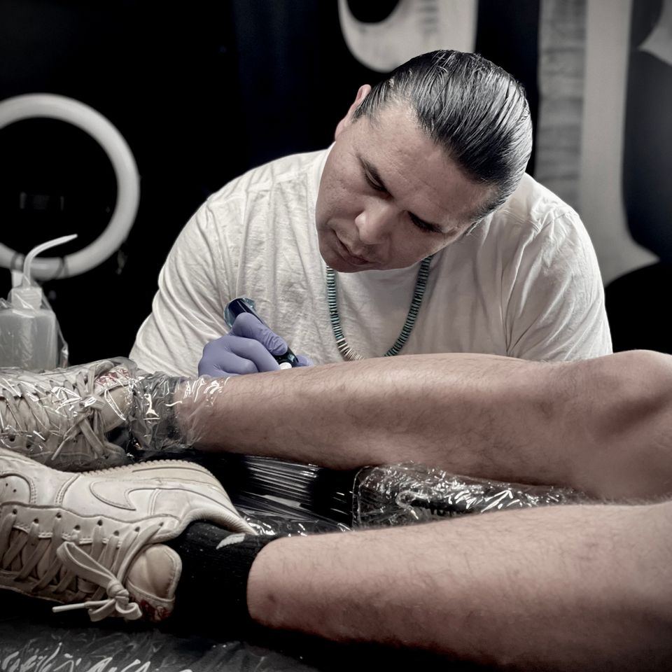 Img adrian tattooing calf