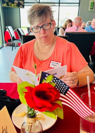 Lucinda looks at program