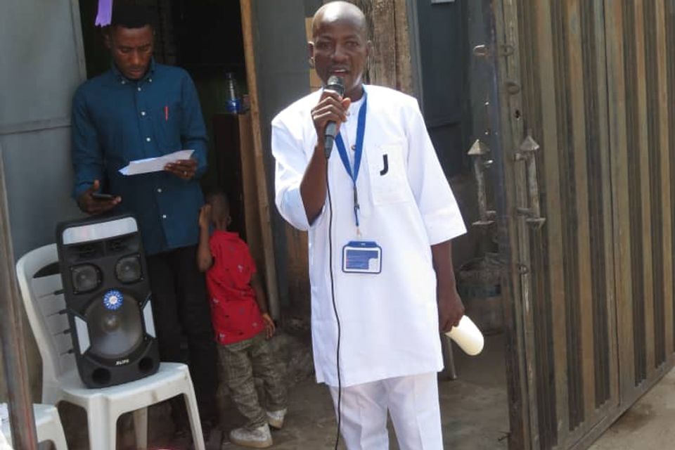 Olufemi adekanbi giving a speech at the party