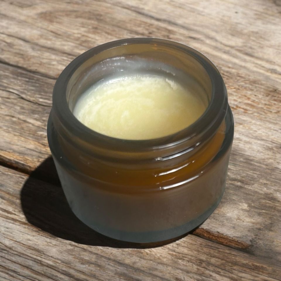 1oz healing salve wood background photoroom