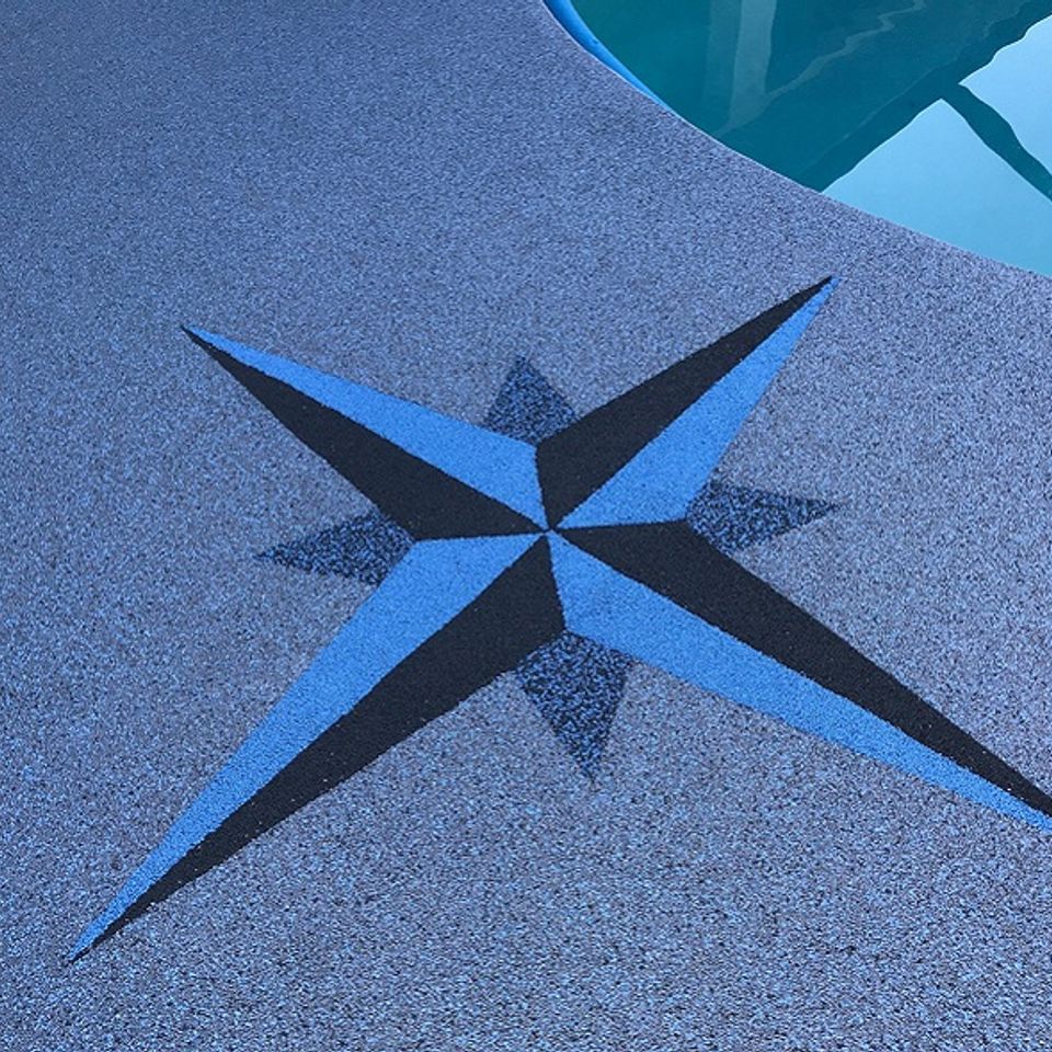 EverStone Flex pool deck featuring a decorative compass design.  Image