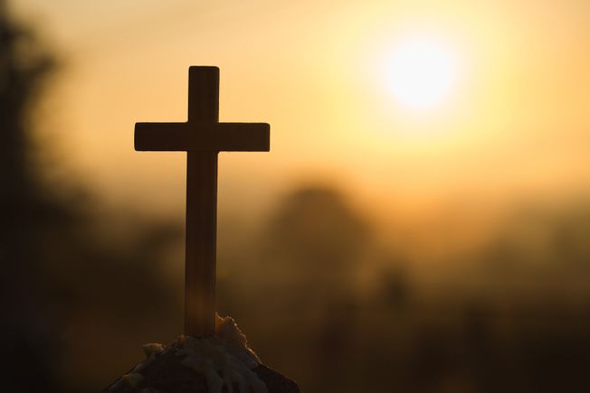 Bigstock christian wooden cross on a ba 283150660