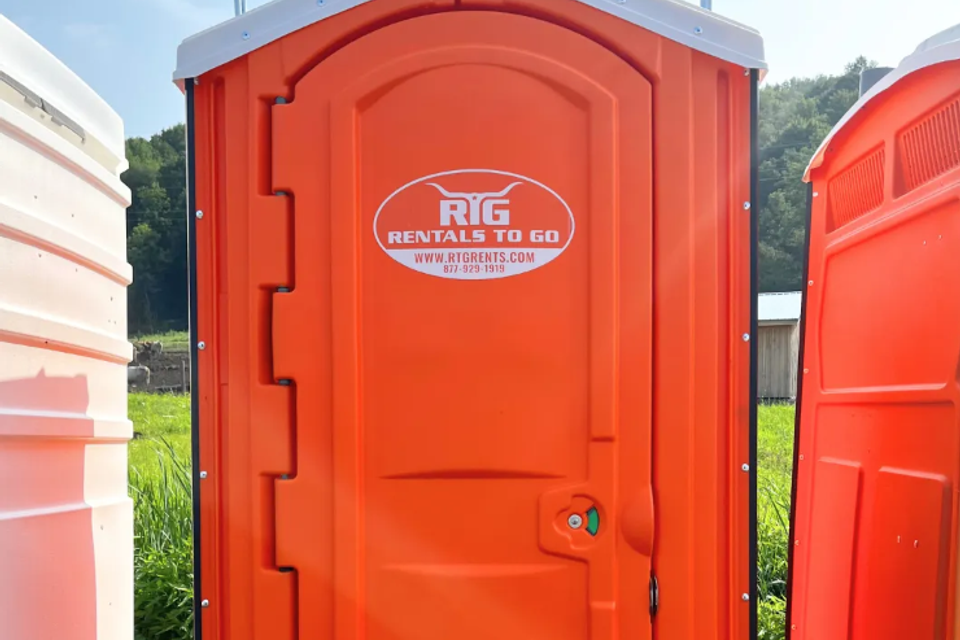 Construction porta potties positioned across work zones at a job site in Turkey, Texas