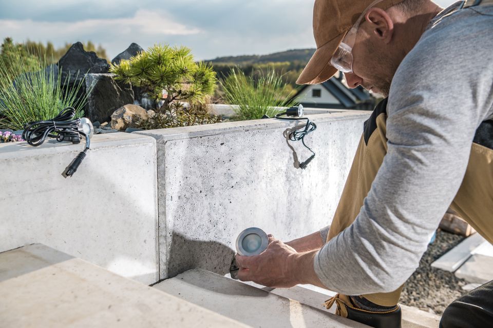 mason sealing small cracks in concrete