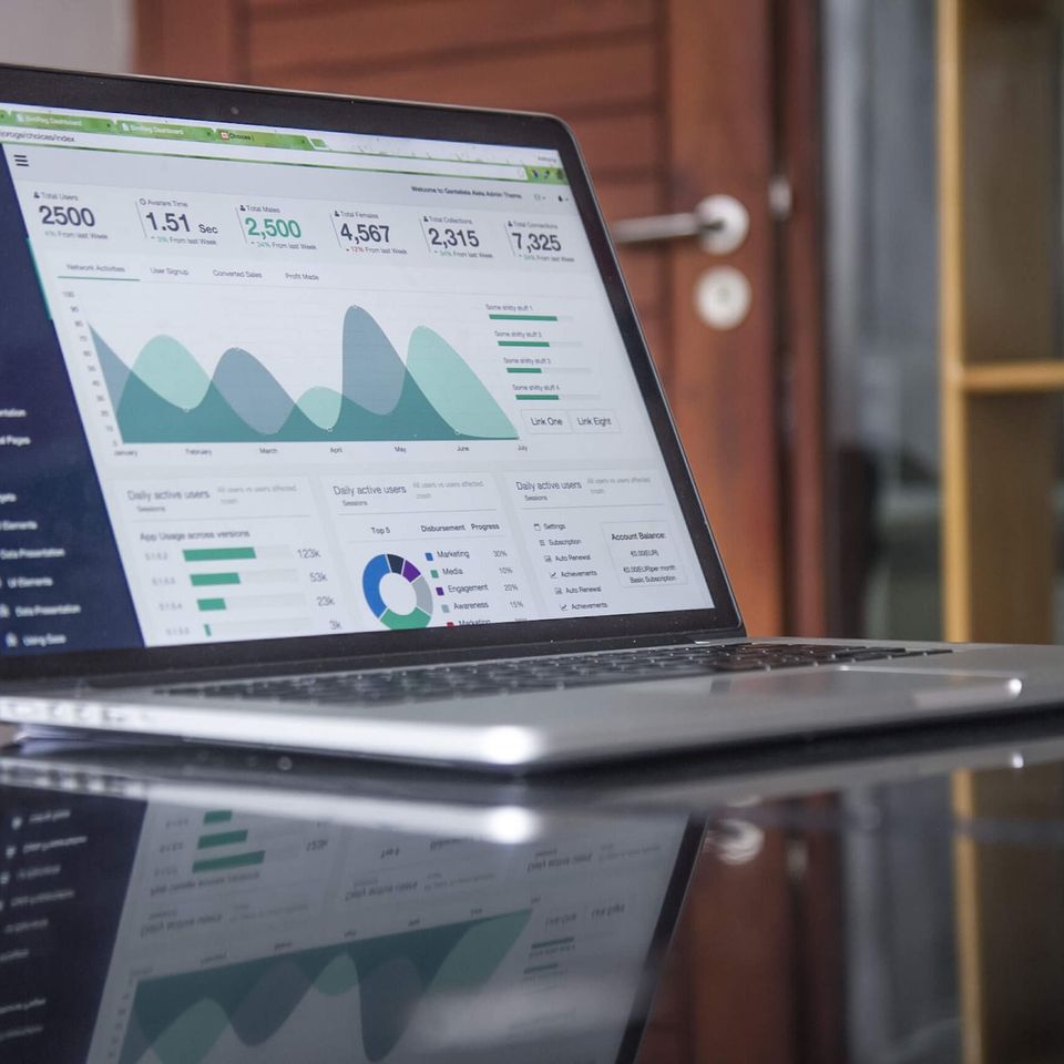 open laptop with SEO metrics on screen