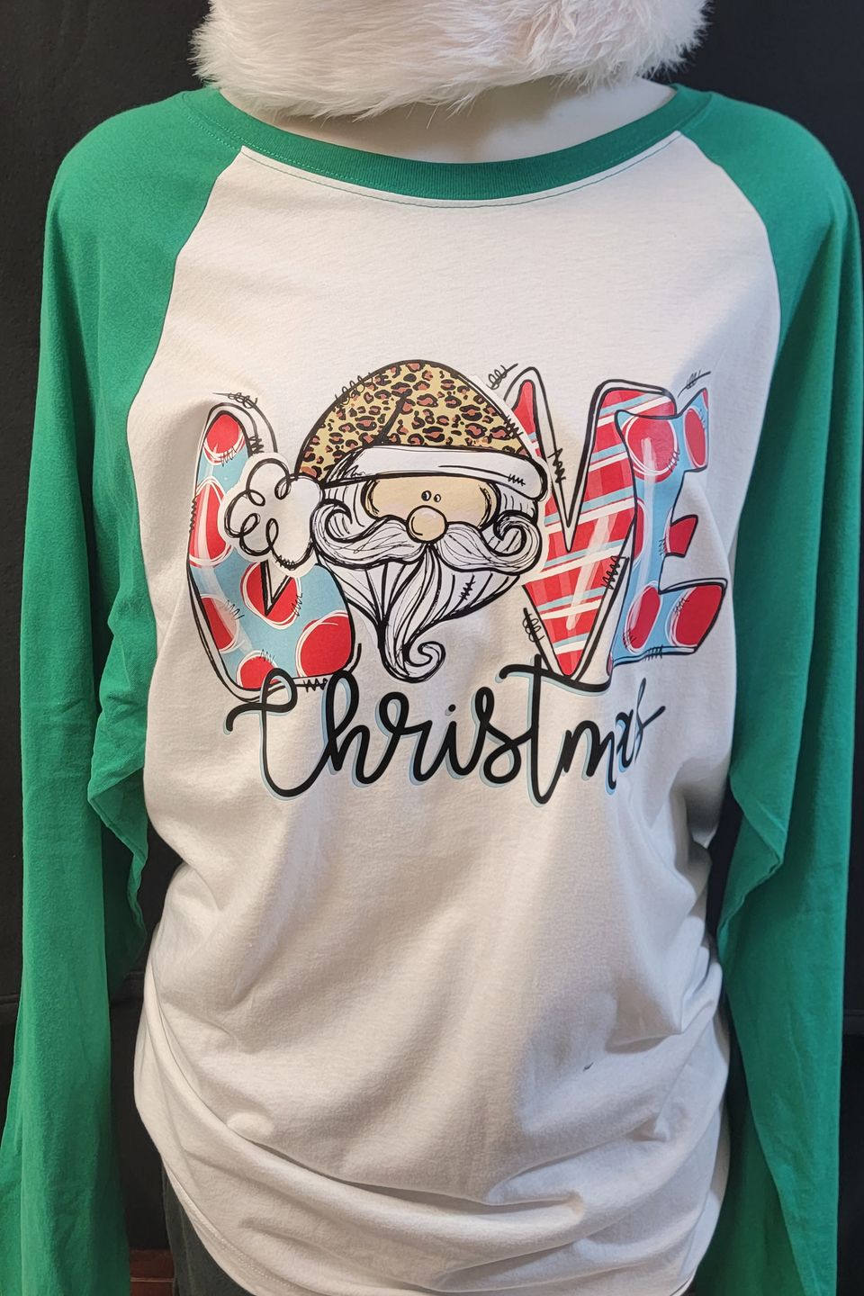 Example of a "Love Christmas" t-shirt using direct-to-film transfer (DTF) from SaRi's Creations.