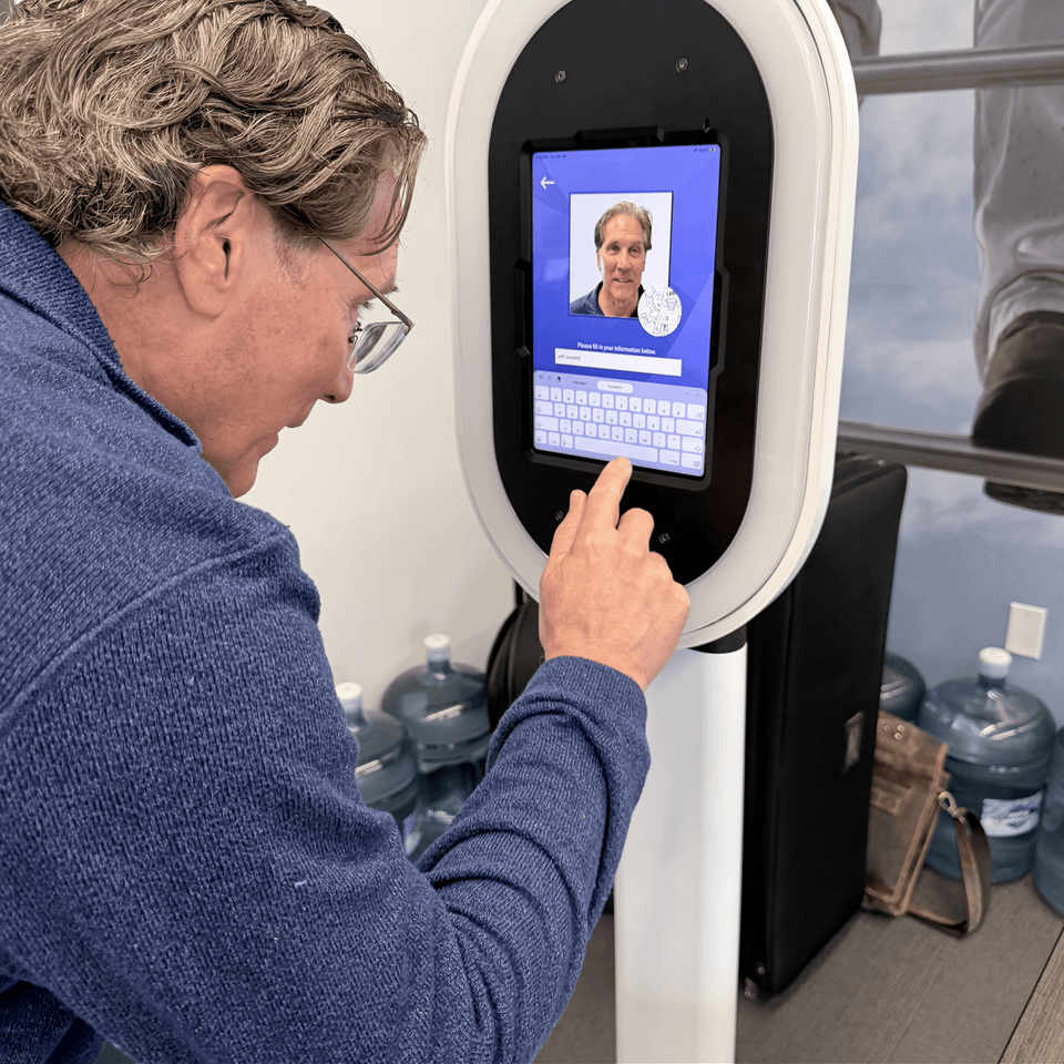 AI Sketch Bot producing digital sketches at corporate events, cycling through guest photos and branded sketches.