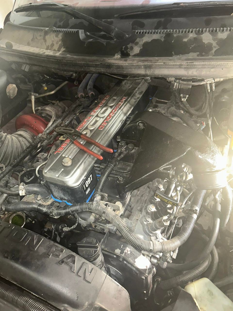 Dodge Cummins intercooled turbo diesel engine bay during truck service in Arab Alabama