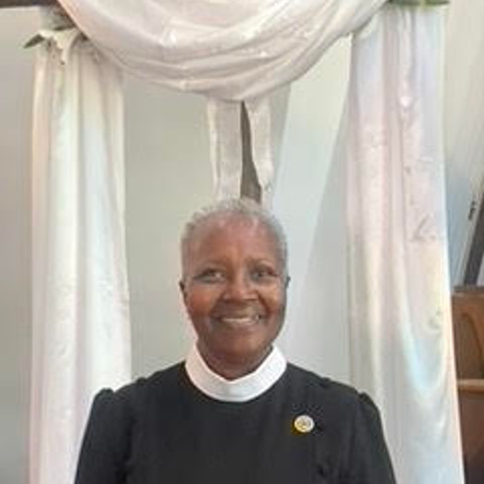 Portrait of Pastor Betty Lee of Grace Evangelistic Temple Church, known for her inspirational preaching and commitment to serving the congregation.