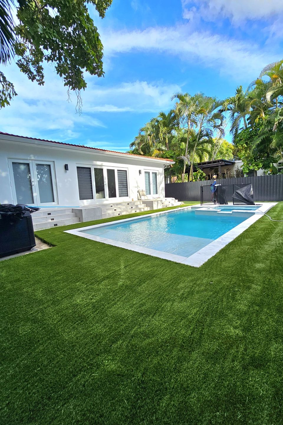 Beautiful synthetic grass around pool area