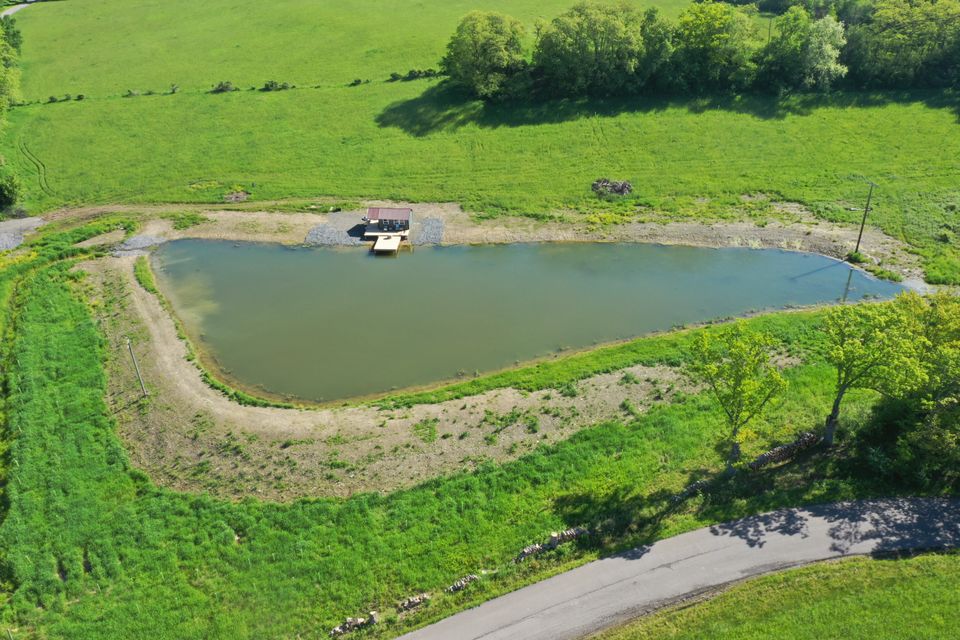 2025 arial drone looking north pond and cabin
